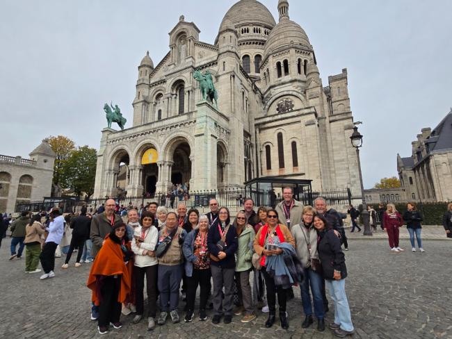 Pilgrims_In_front_of_the_Sacred_Heart_of_Jesus_Bascilica_in_Paris_resized.jpg